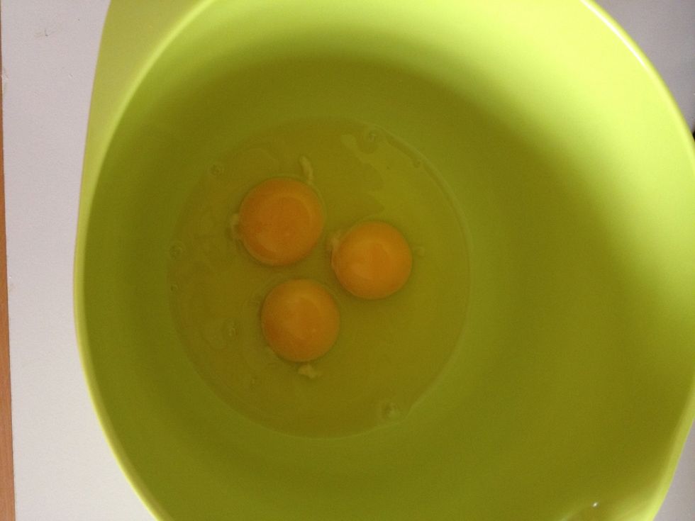 Crack 3 eggs in a bowl. Whisk