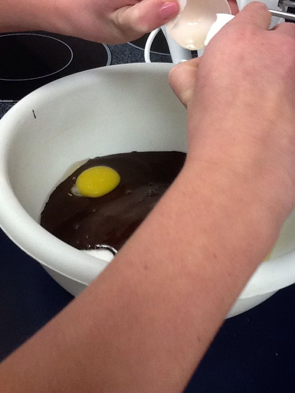 Crack 4 eggs into the bowl