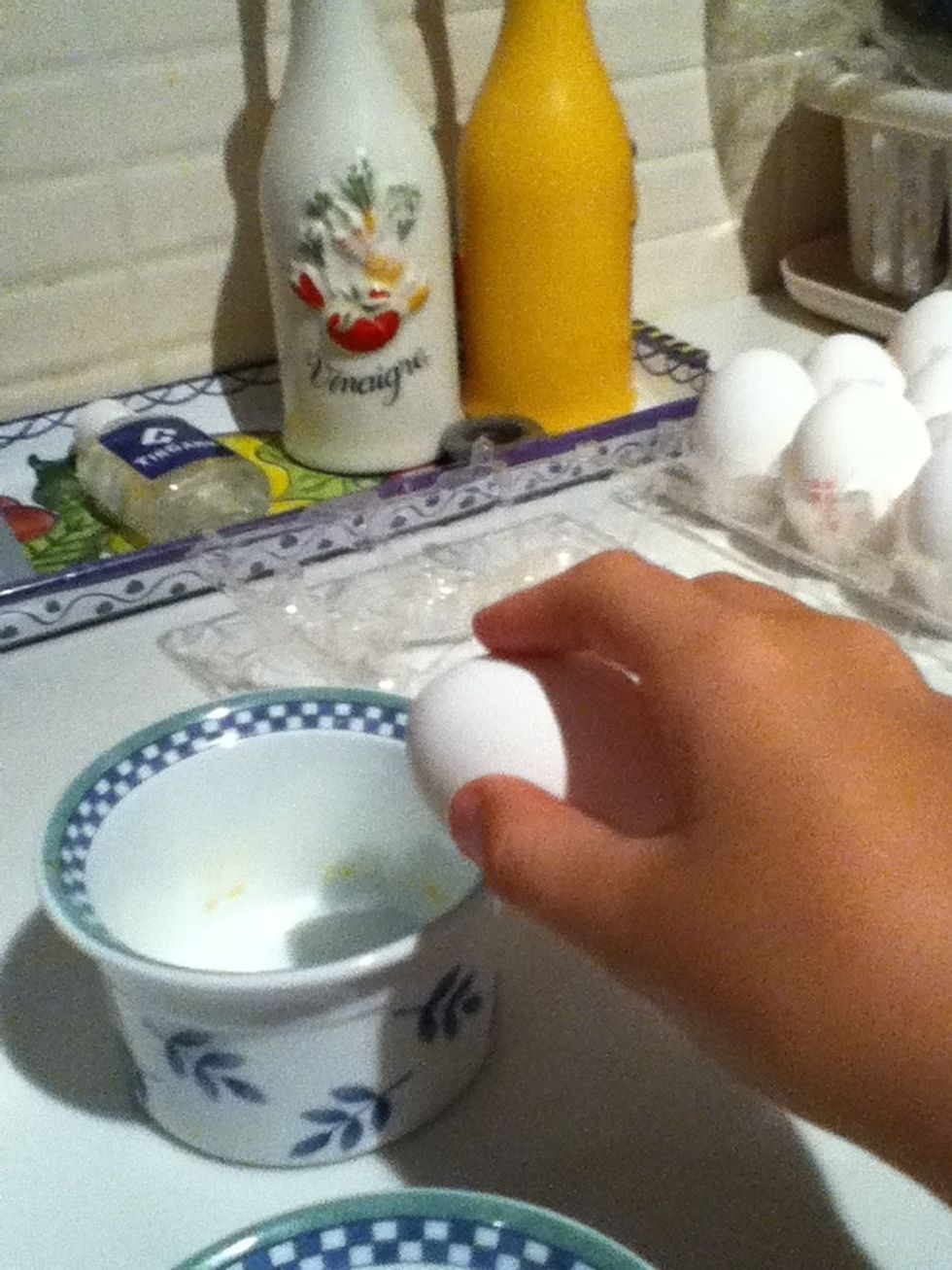 Crack a egg in the ramekin cerfuly and make shor their is no egg shell in it.