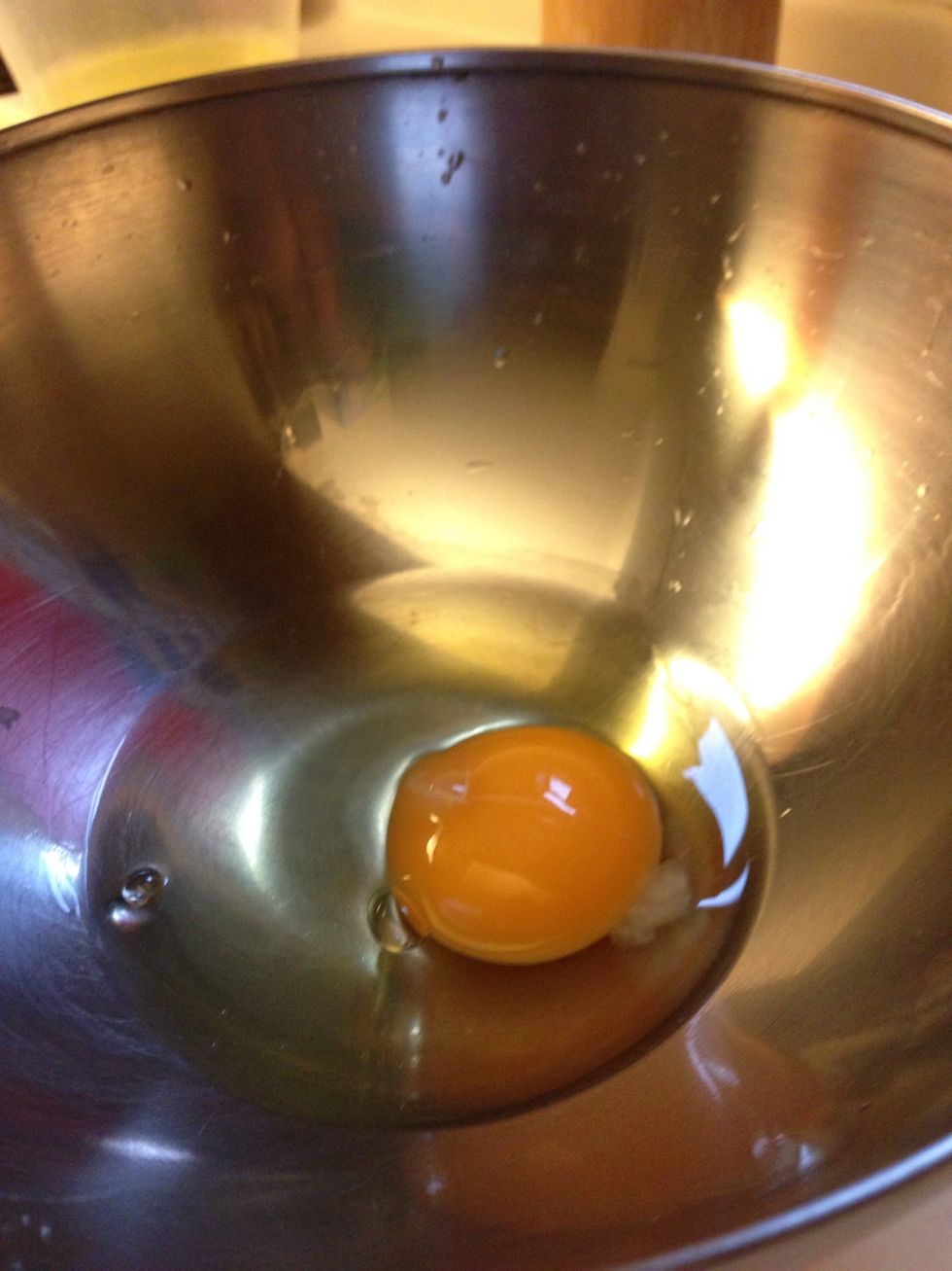 Crack an egg in a bowl