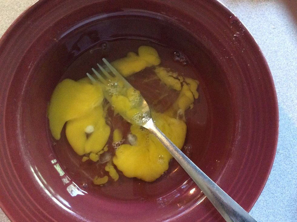 Crack and beat eggs.