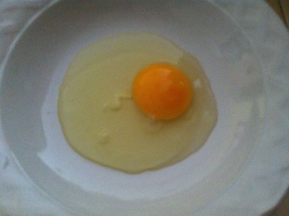 Crack egg and add a little soy milk or lactose free milk, juice and start mixing