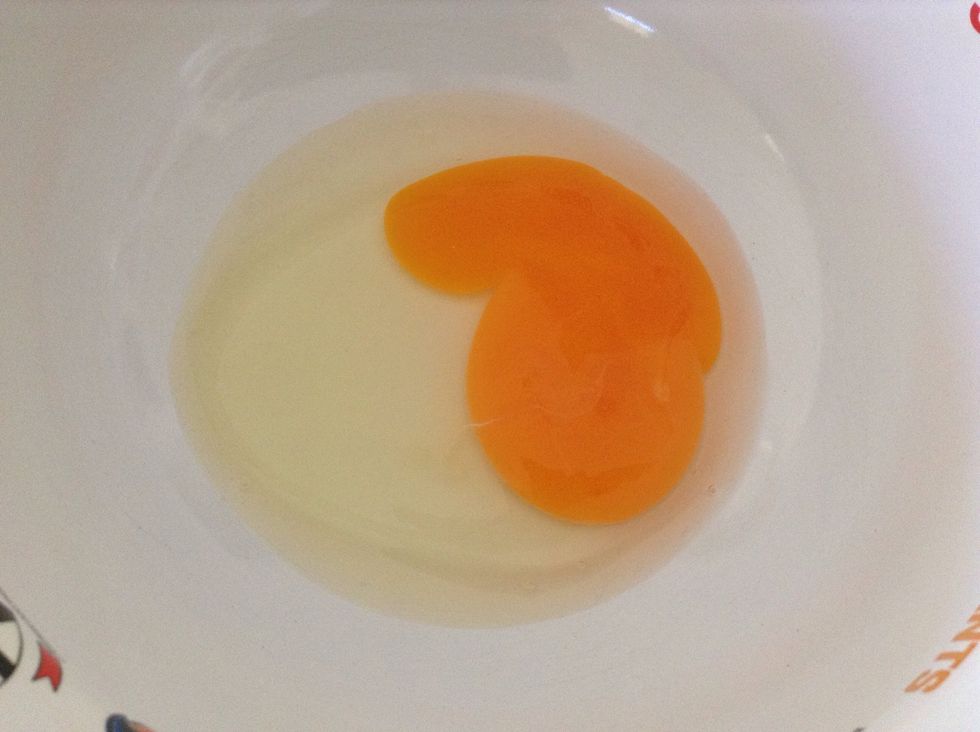 Crack egg into a bowl