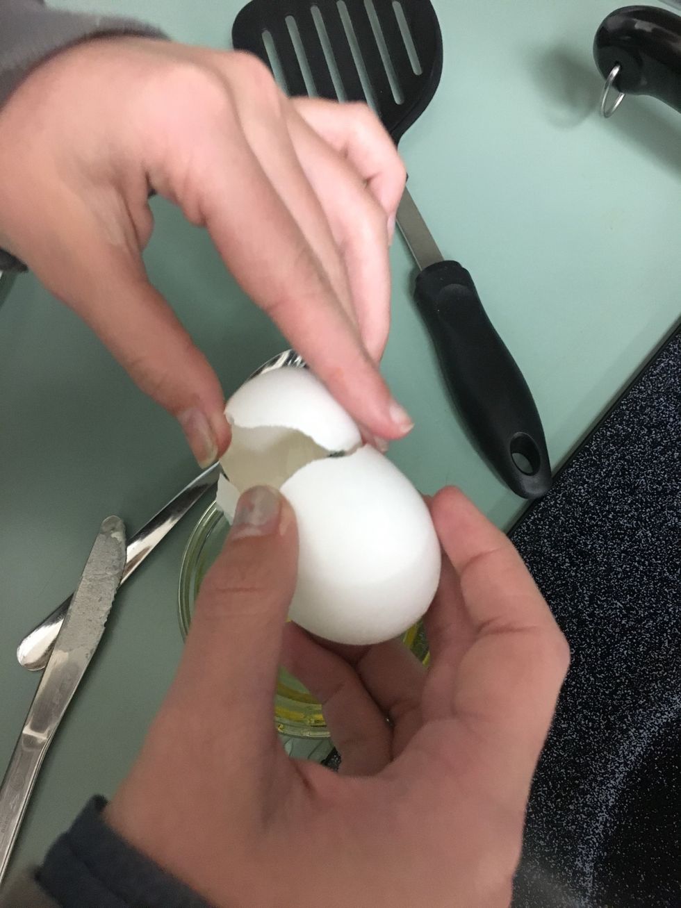 Crack egg into custard cup