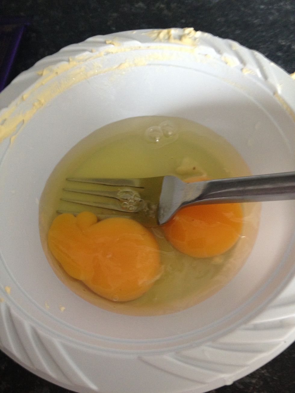 Crack eggs and beat in separate bowl