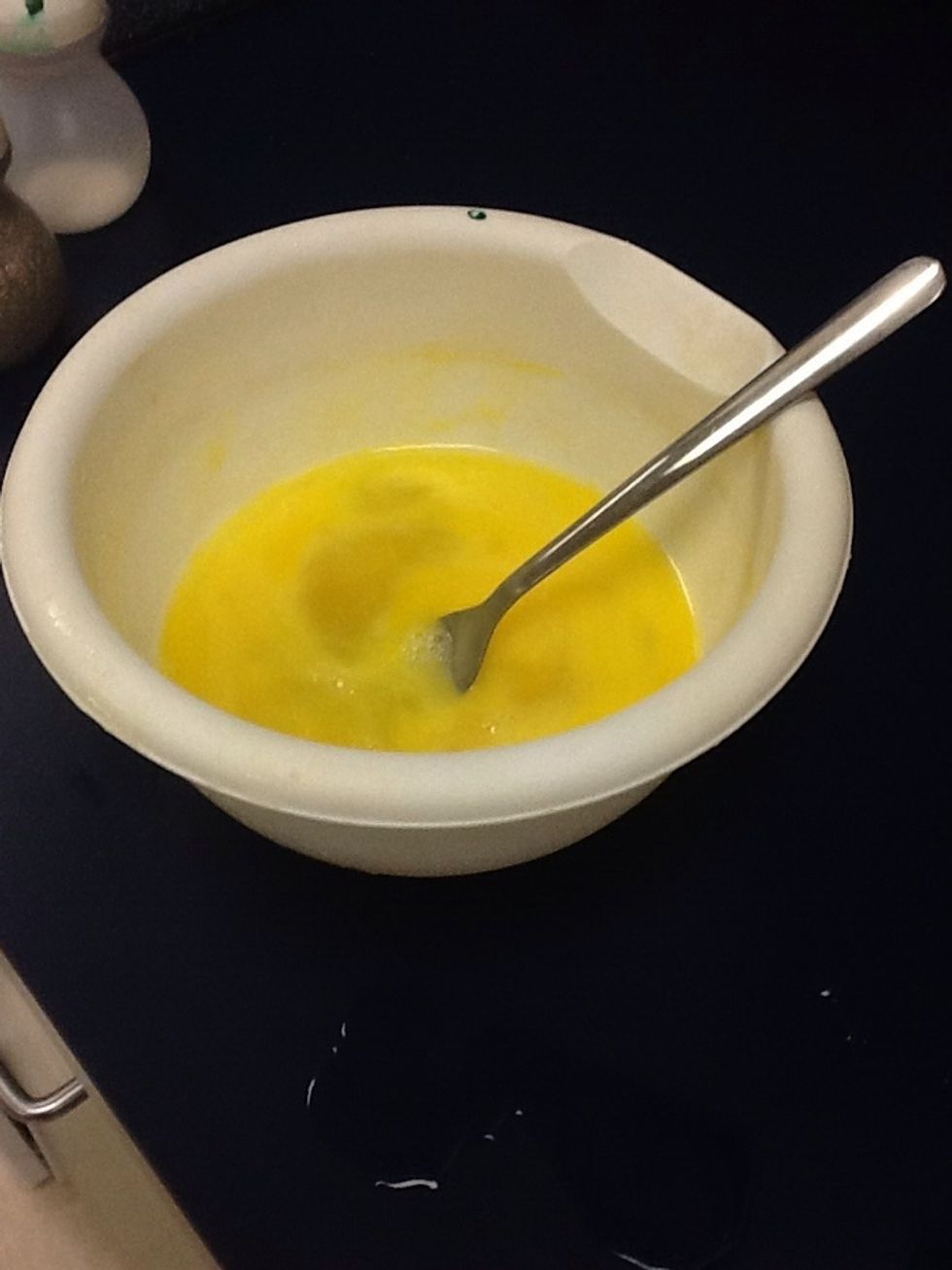 Crack eggs into bowl and beat them lightly with your fork.