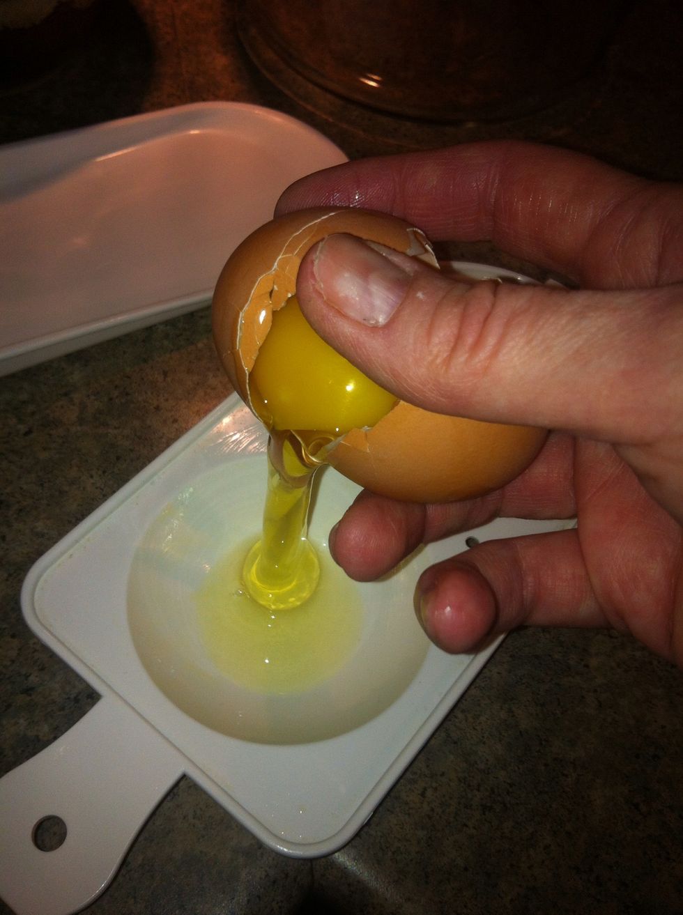 Crack eggs into poacher