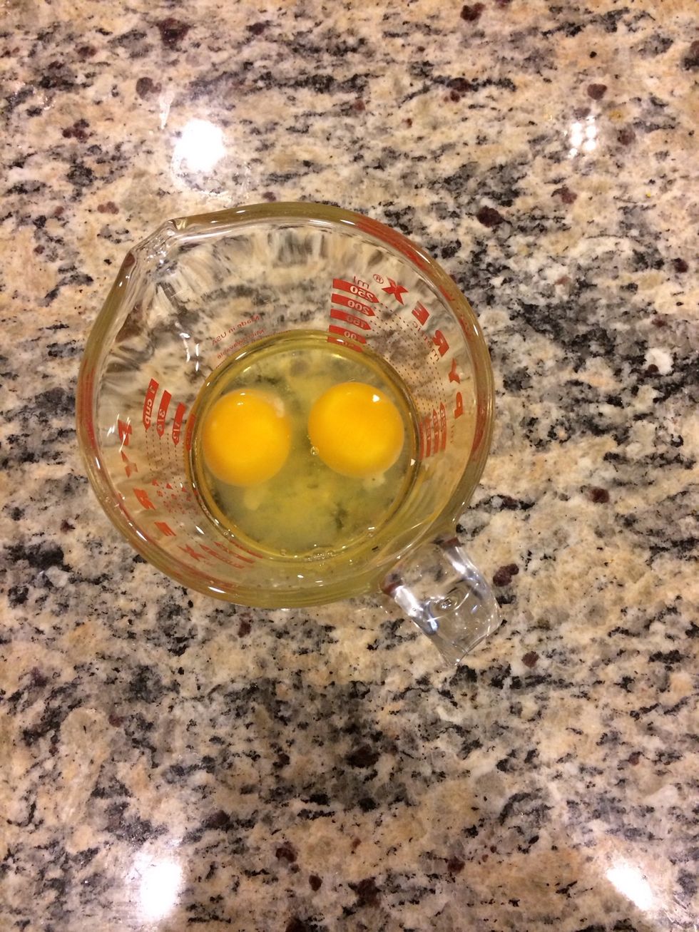 Crack eggs into small bowl