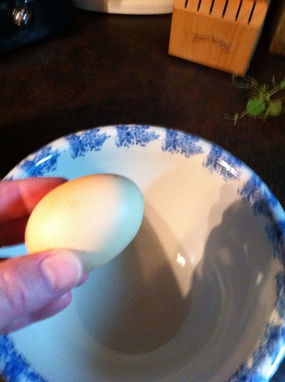 Crack open one egg. I've got one of my fresh hen eggs. \ud83d\udc14