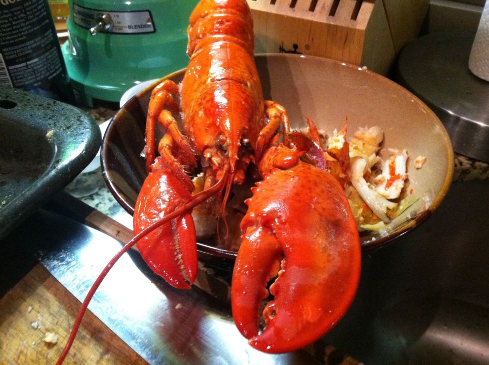 Crack tail, claws and extract head meat n fat. Reserve. Throw all shells and whole head in a large stew pot