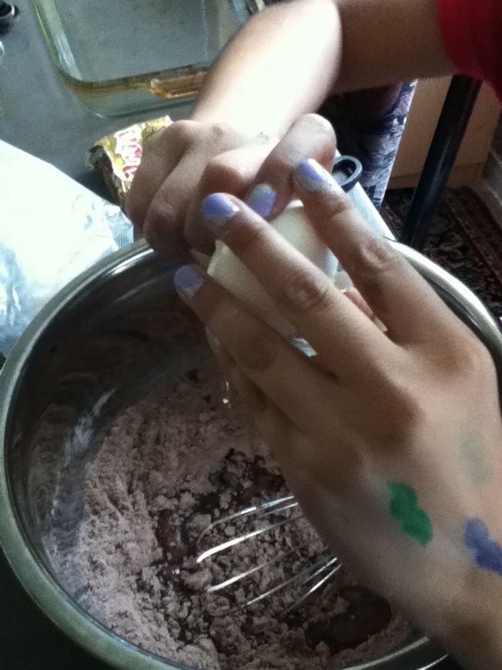 Crack the egg and put it in