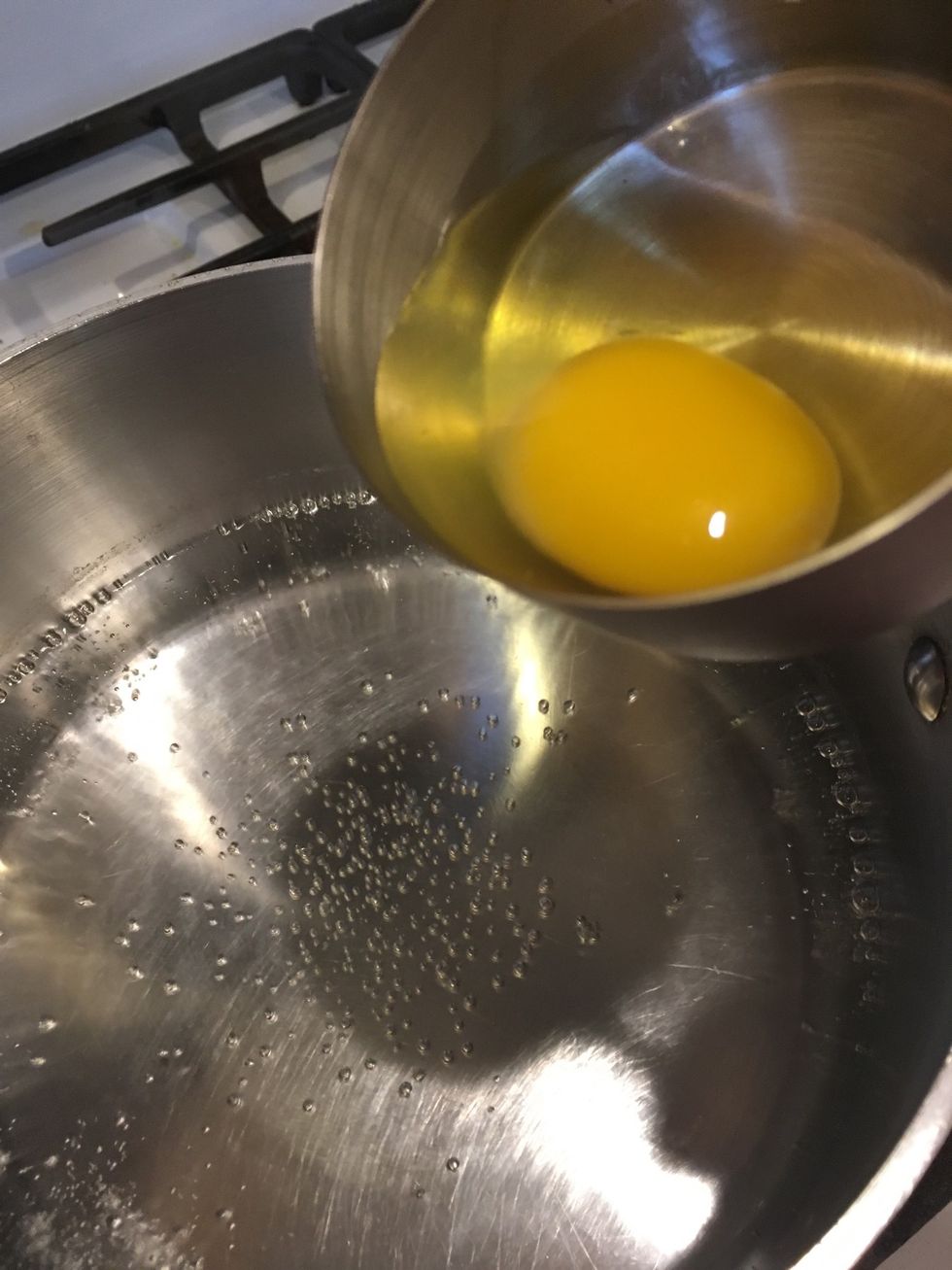 Crack the egg into a small bowl. I used a measuring cup.