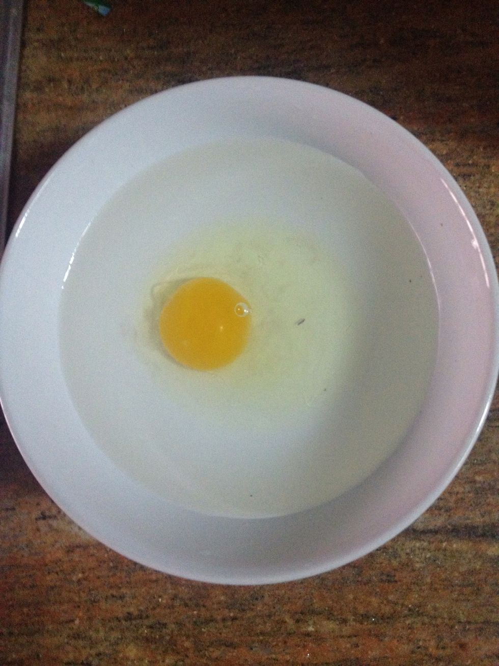 Crack the egg into the bowl