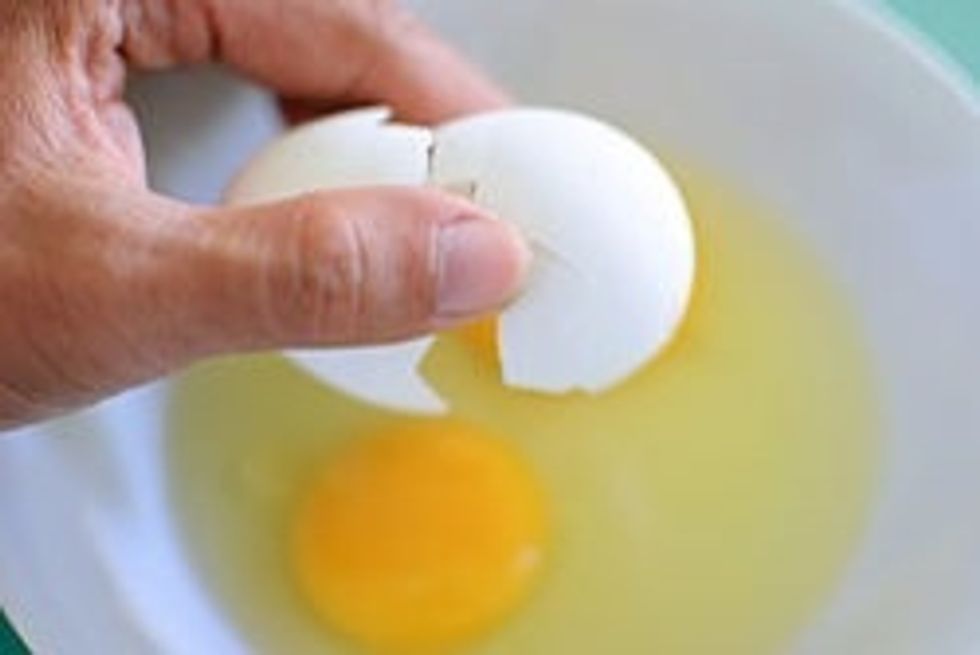 Crack the eggs into a bowl