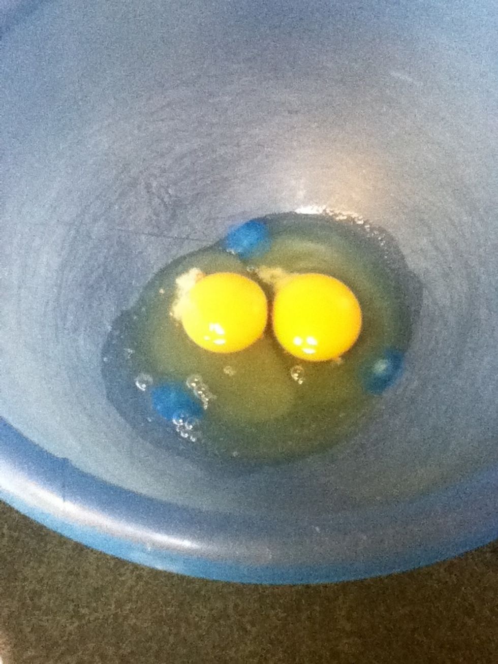 Crack the eggs into a bowl