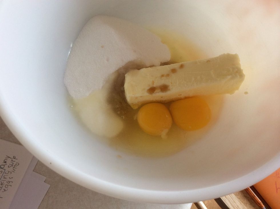 Crack two eggs into a custard cup and check to see if there is any shell in there. After making sure there is no shells, pour eggs into the bowl.