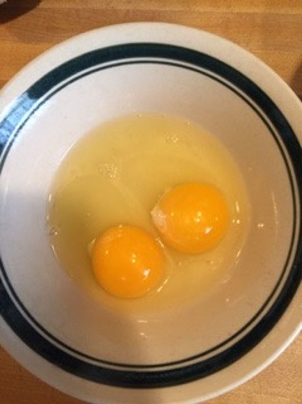 Crack two eggs