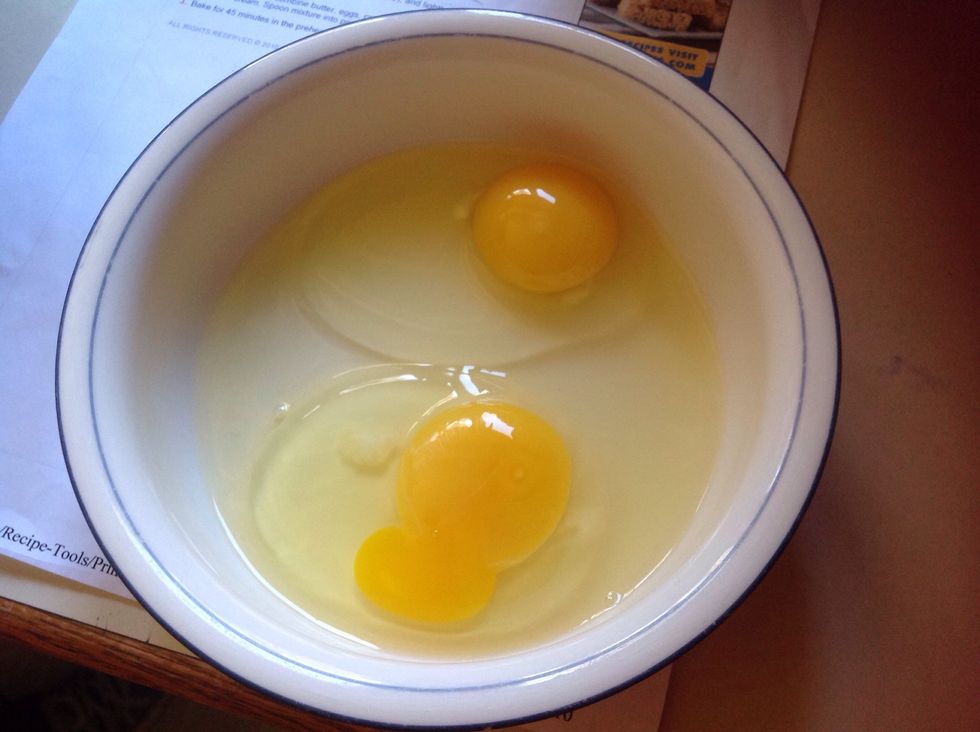 Crack two eggs