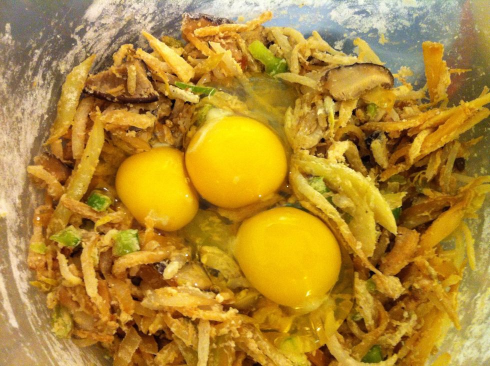 Crack your dozen eggs into a bowl, remove any egg shells (this is for amateur chefs who don't know how to crack eggs well). Add eggs to the bowl mixture.