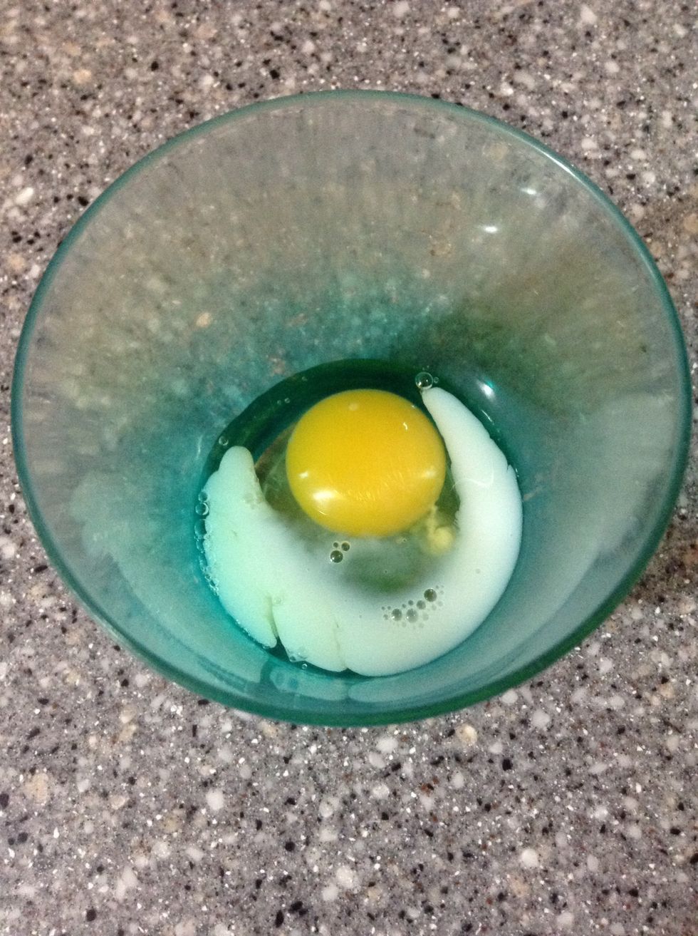 Crack your egg and put milk with the egg in a cup and mix
