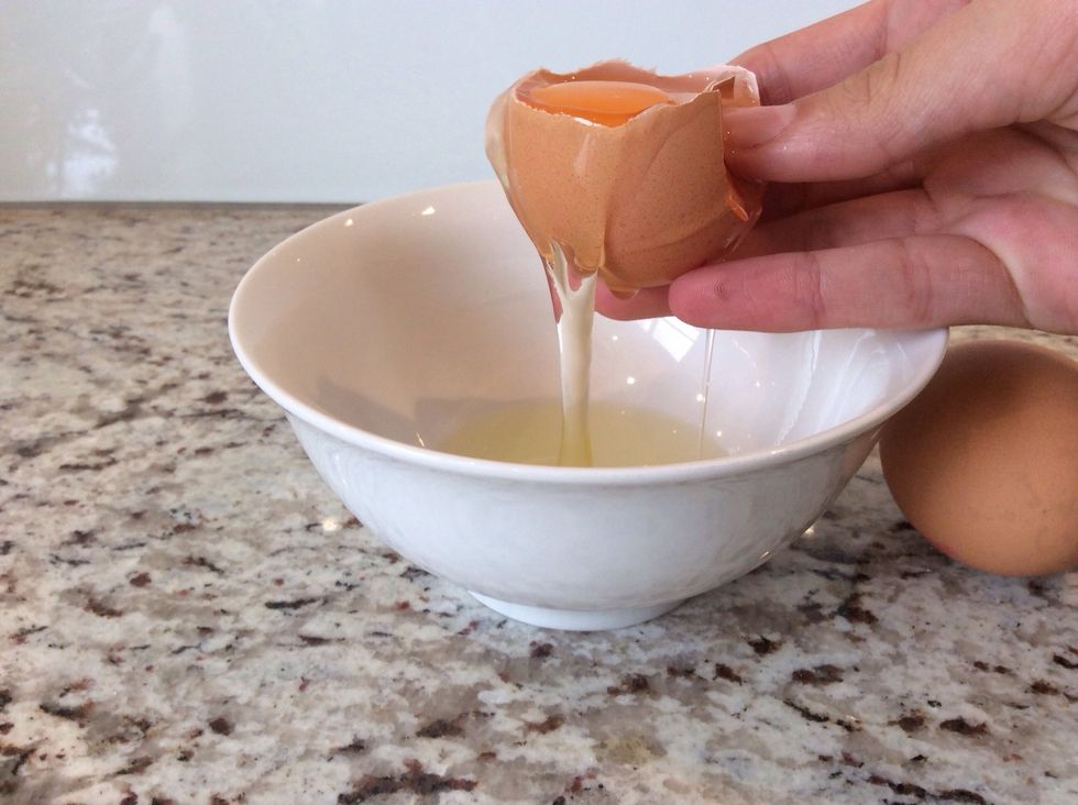 Crack your eggs and pour the egg whites into a bowl (1-2 minutes) make sure you don't get any shell in the egg whites.