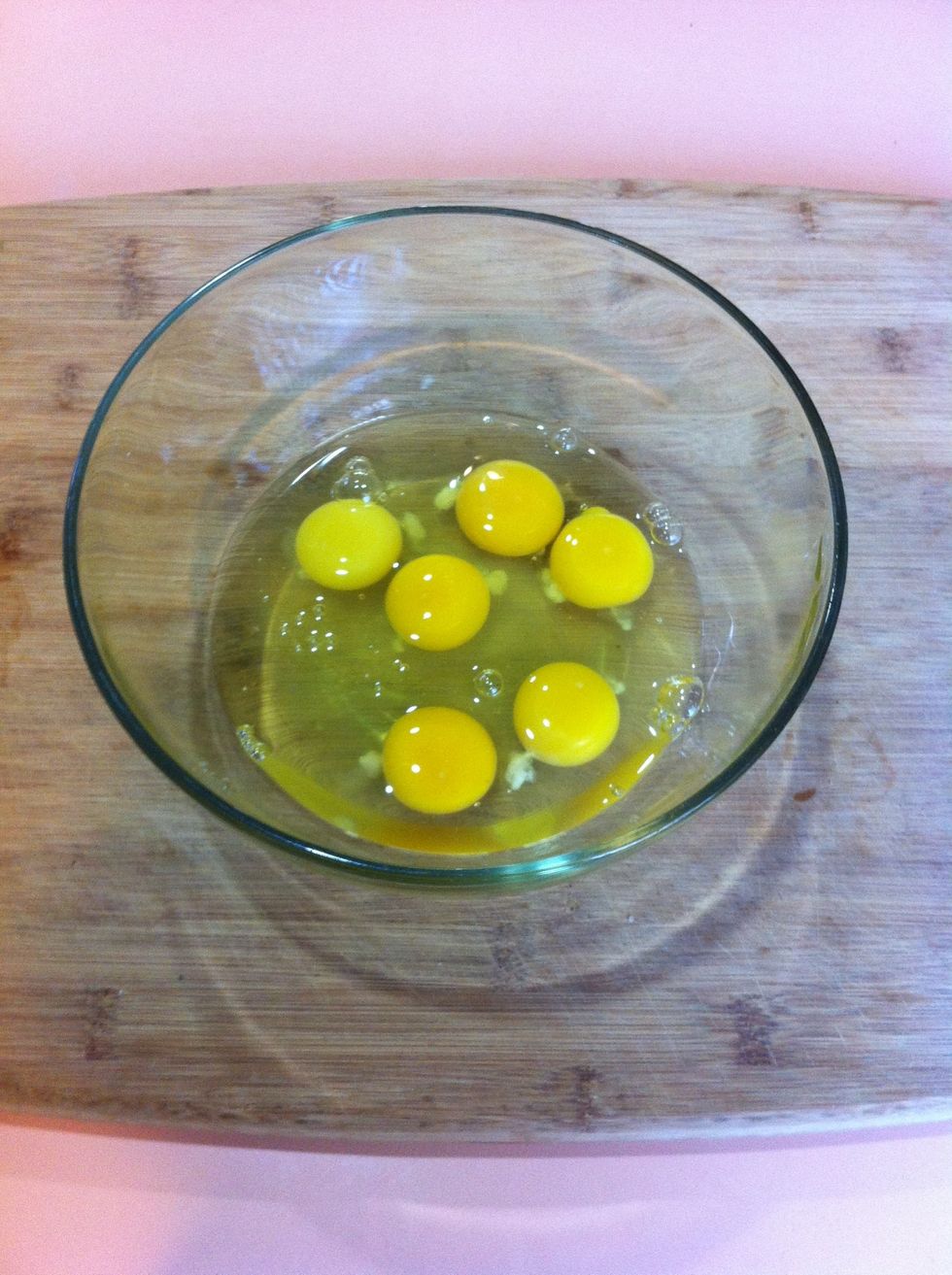 Crack your eggs in a large bowl.
