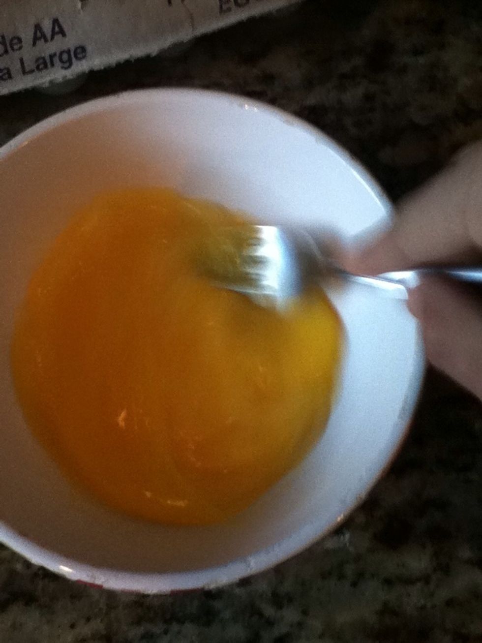 Crack your eggs into a bowl and whisk away!