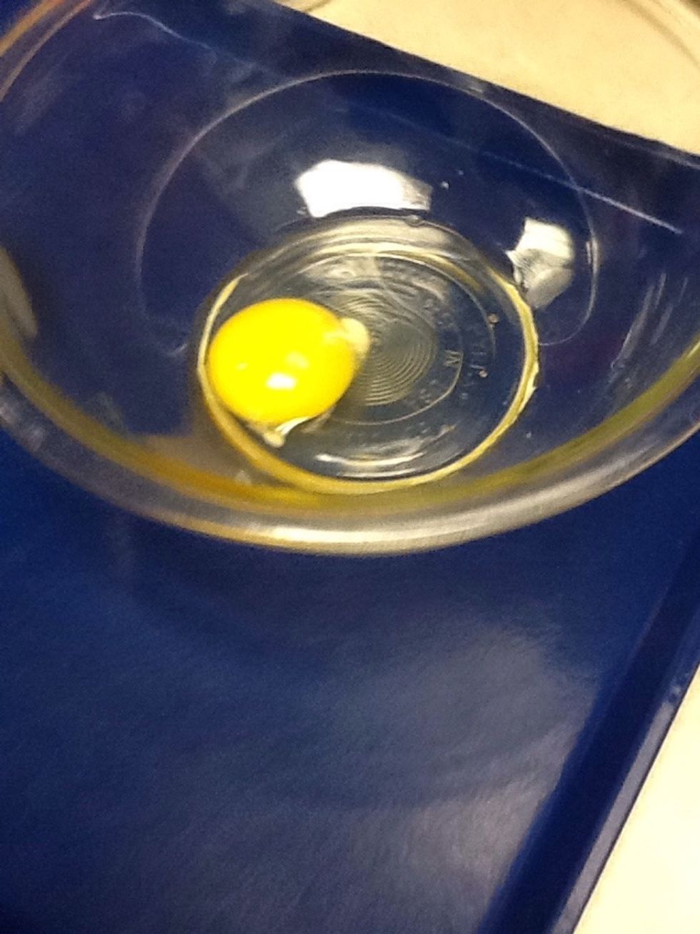 Creak 1 egg into different bowl then beat egg