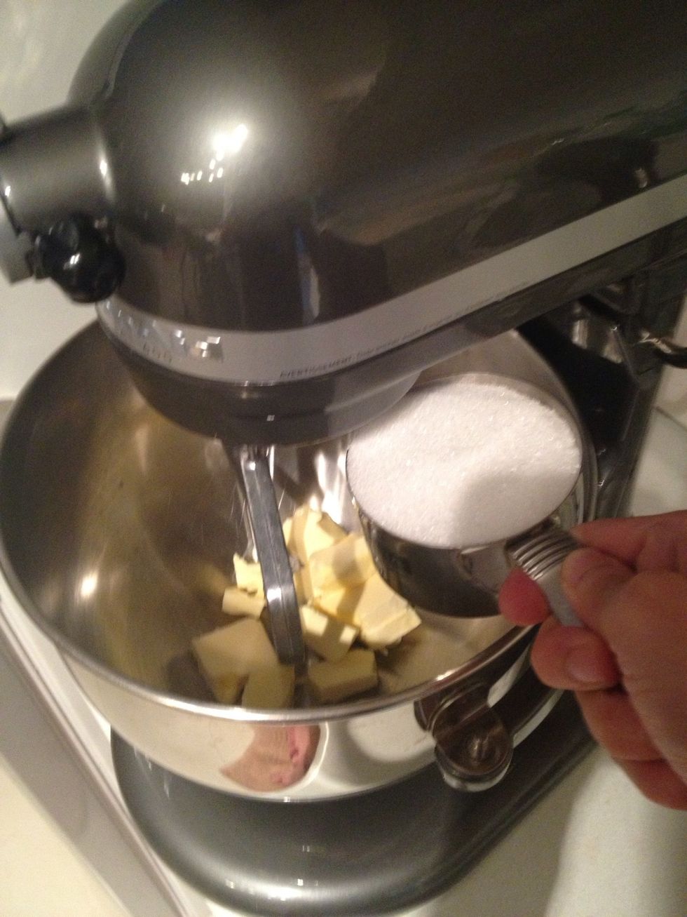 Cream butter and sugar together. Pre heat the oven to 180