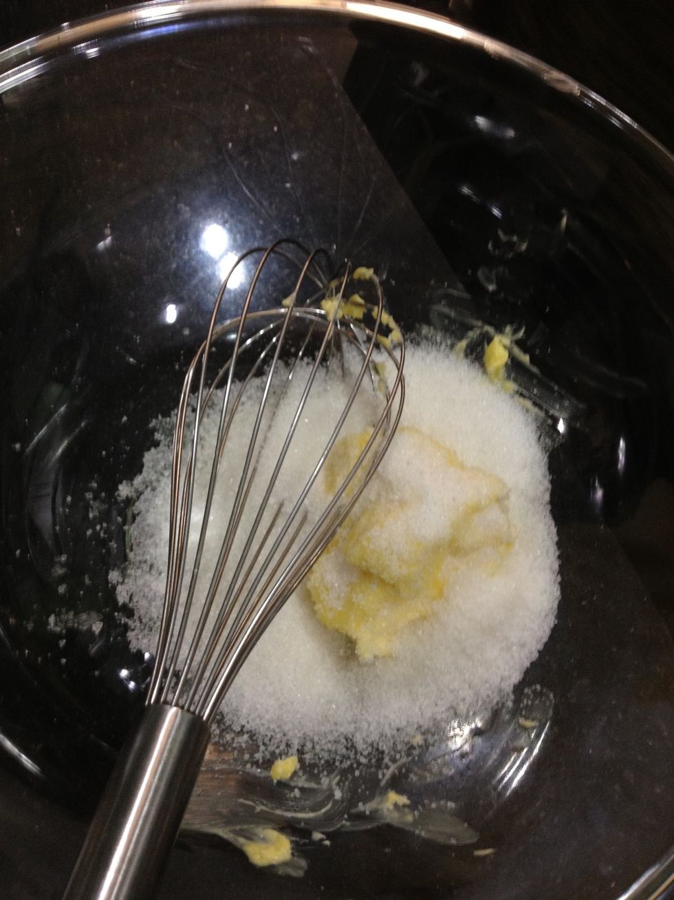 Cream butter (which has to be at room temperature) and sugar.