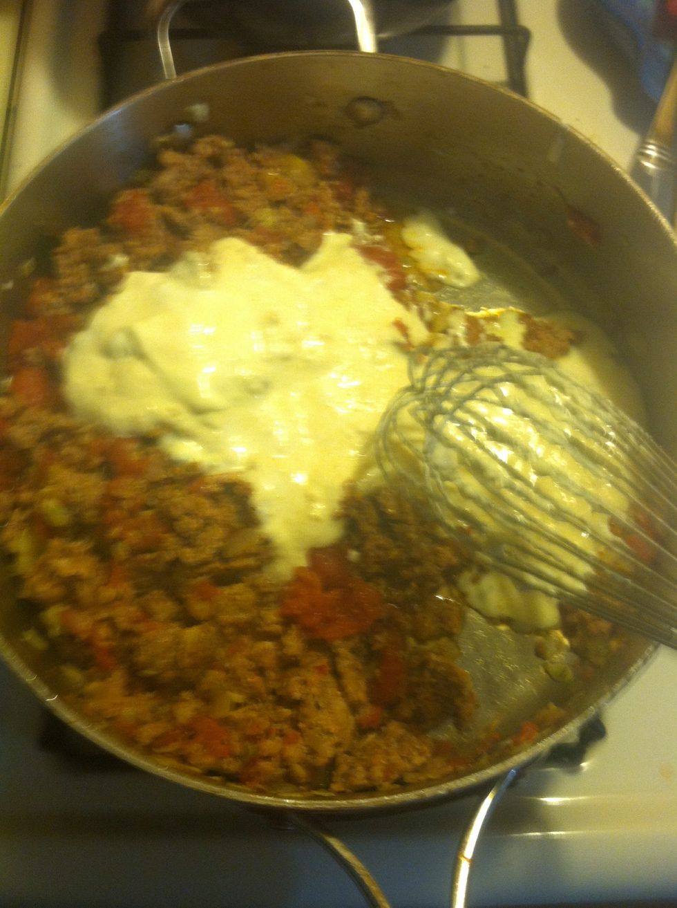 Cream into sausage mixture