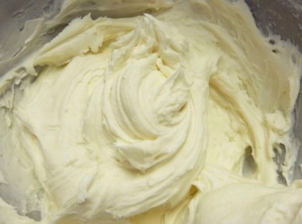 Cream the butter and sugar together until it's fluffy. Die the frosting different colours. I divided a range of pinks and purples.