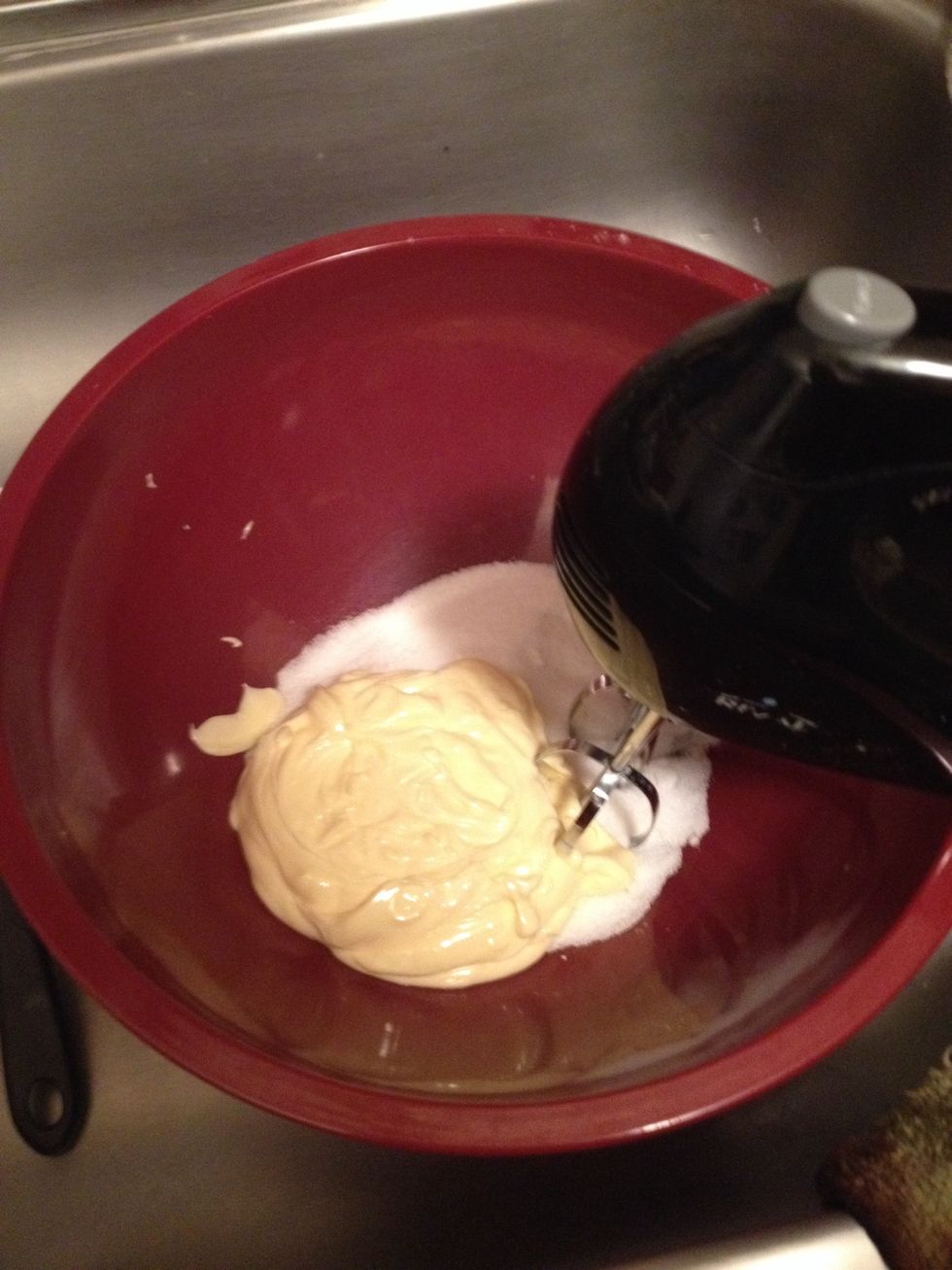 Cream the butter and sugar with a mixer for five minutes, until light and fluffy.