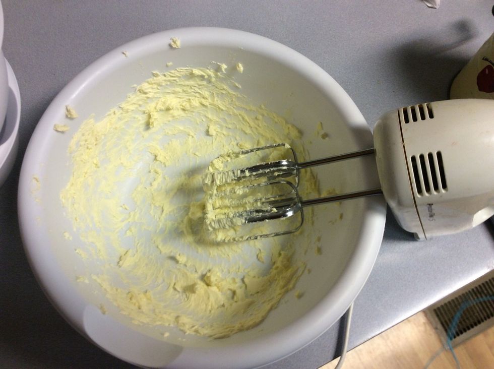 Cream the butter In a large mixing bowl