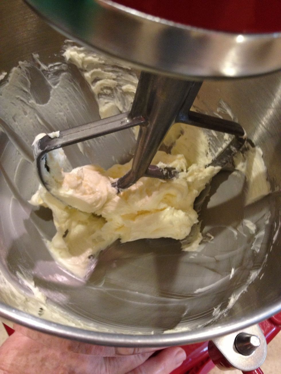 Cream the butter until fluffy.