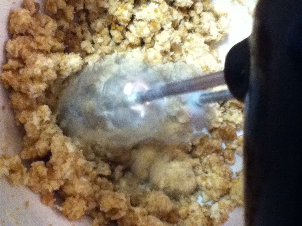 Cream together butter and sugars.