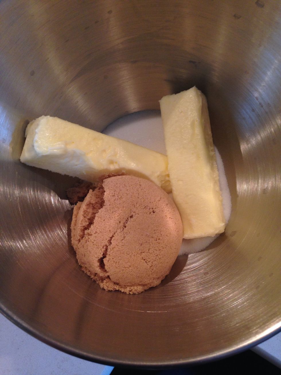 cream together butter, sugar, and brown sugar