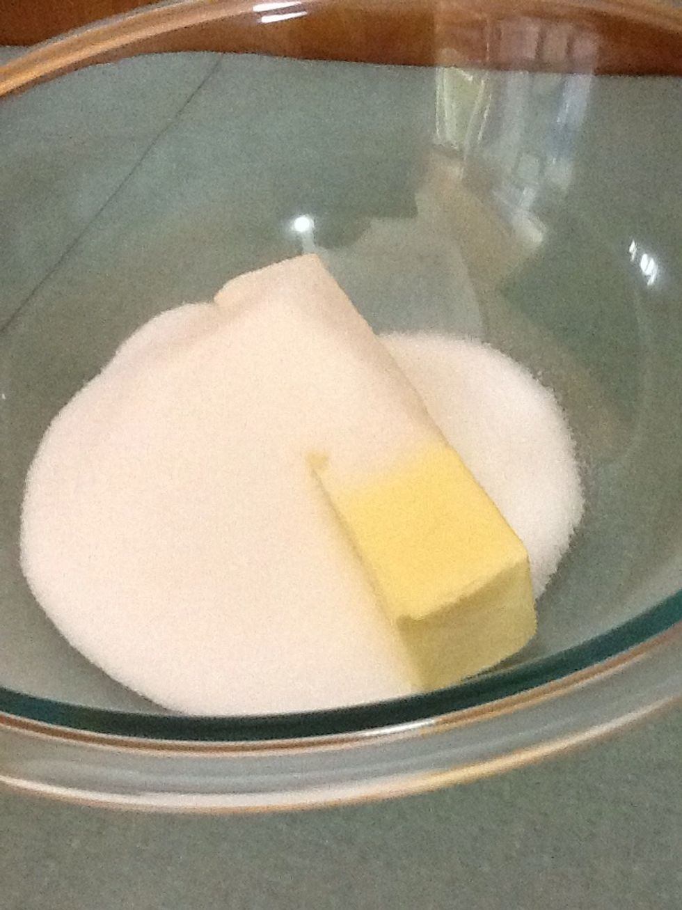 Cream together shortening and sugar