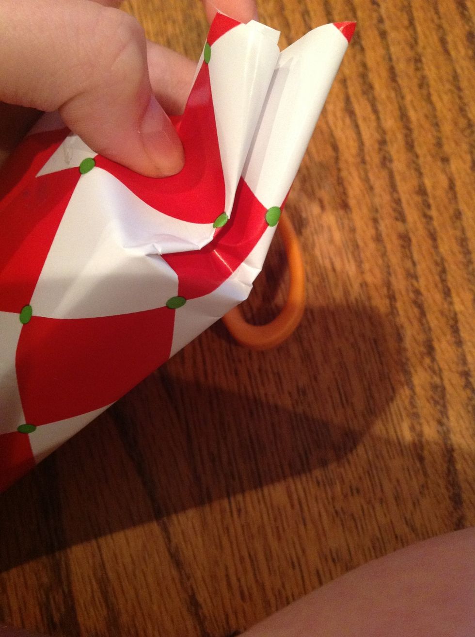 crease it so it will fold easier toward the side of the tape