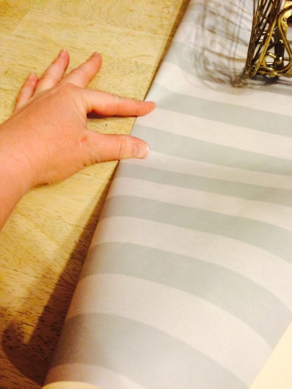 Crease the side.