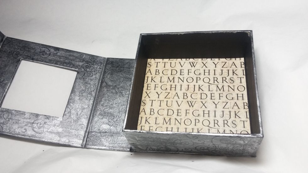 Create a background with a small piece of paper. I was sure to use a light color to try and create contrast.