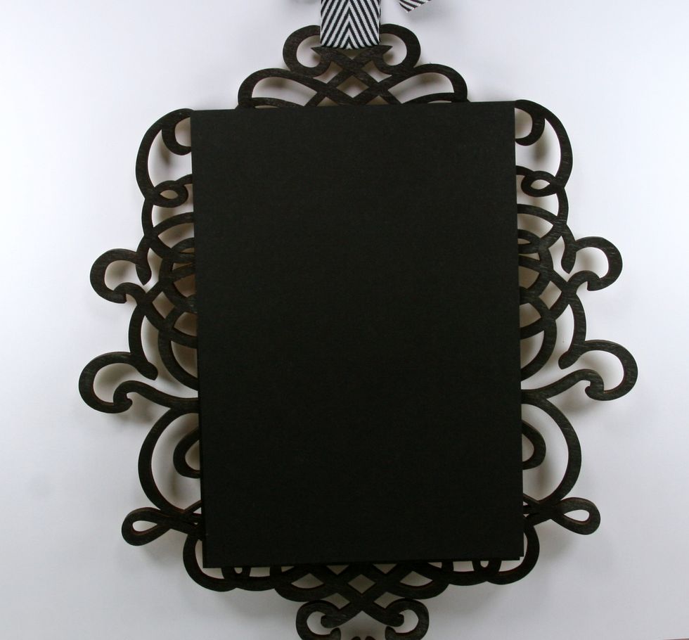 Create a base on the plaque with black cardstock.
