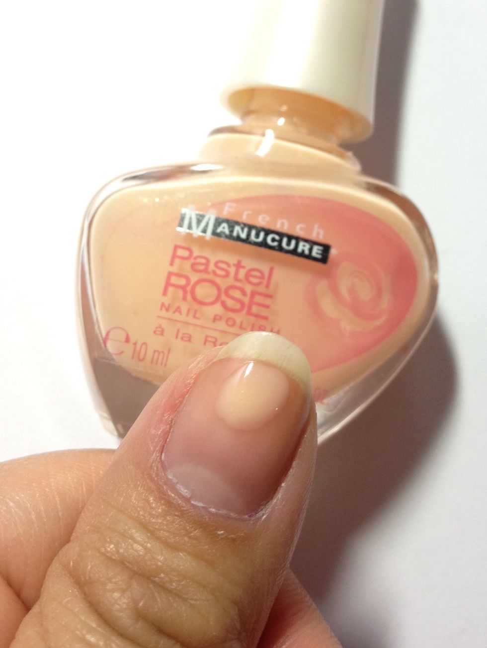 Create a beige circle for the face.