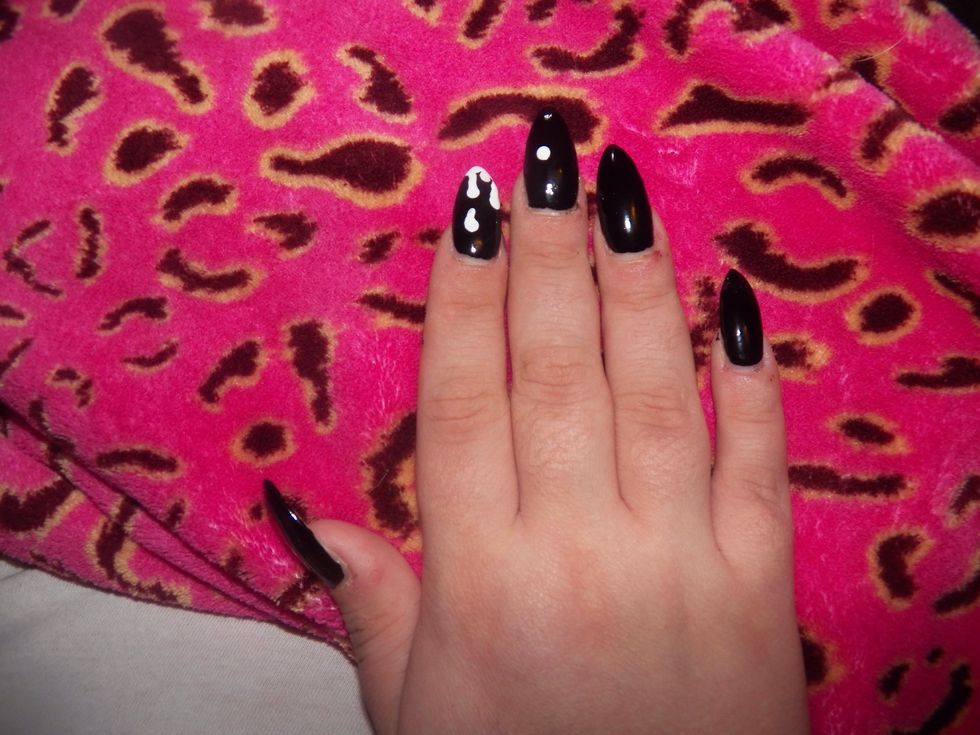 Create a dot near the middle of the nail.