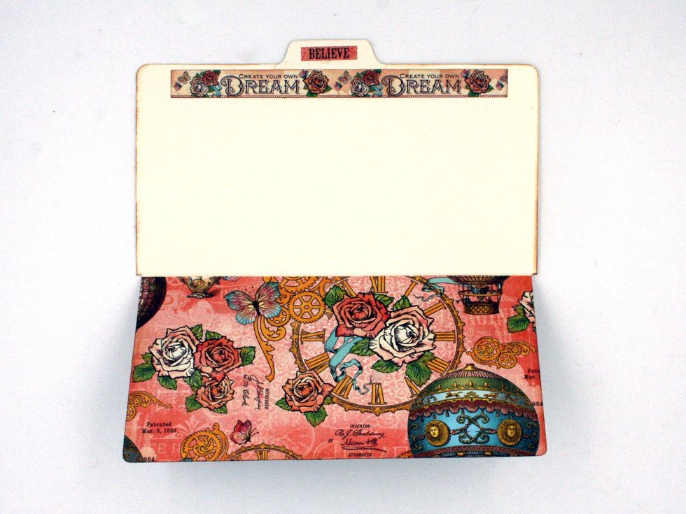 Create a file folder following steps 33-34 to tuck in the pocket page.