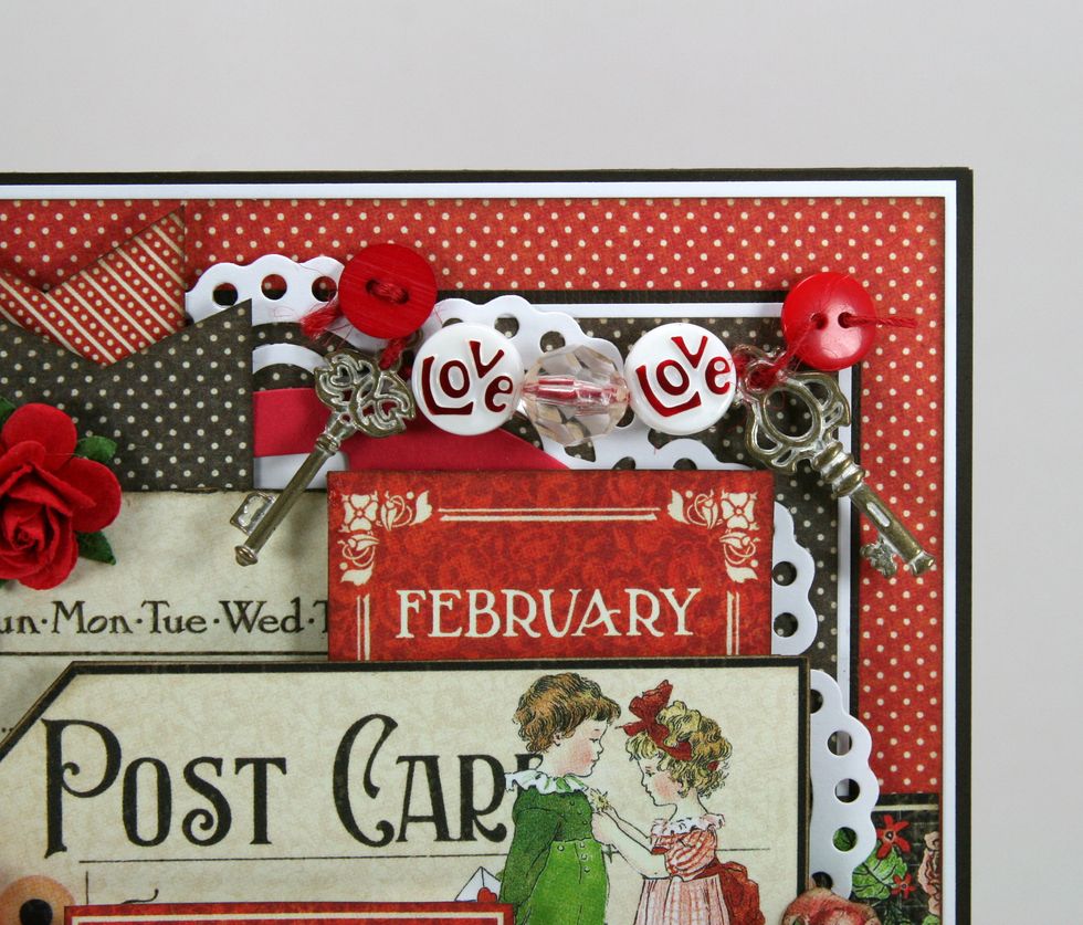 Create a fun and festive banner with Ornate Metal Keys and assorted buttons and bead and red twine. Adhere with hot glue behind the buttons.