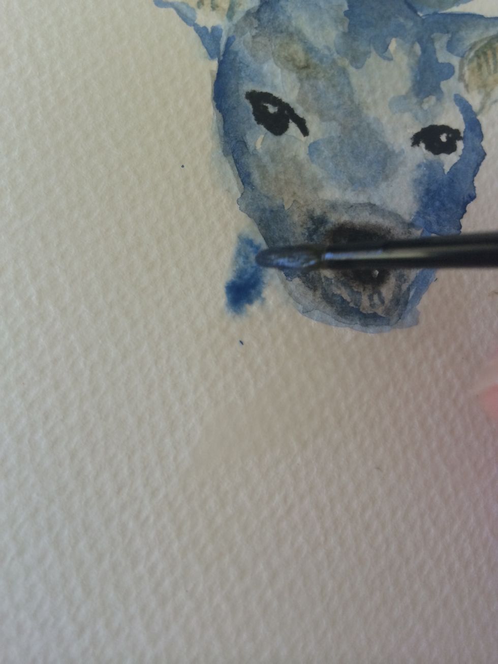 Create a neck shape with water and dab blue and black around the edges letting it seep