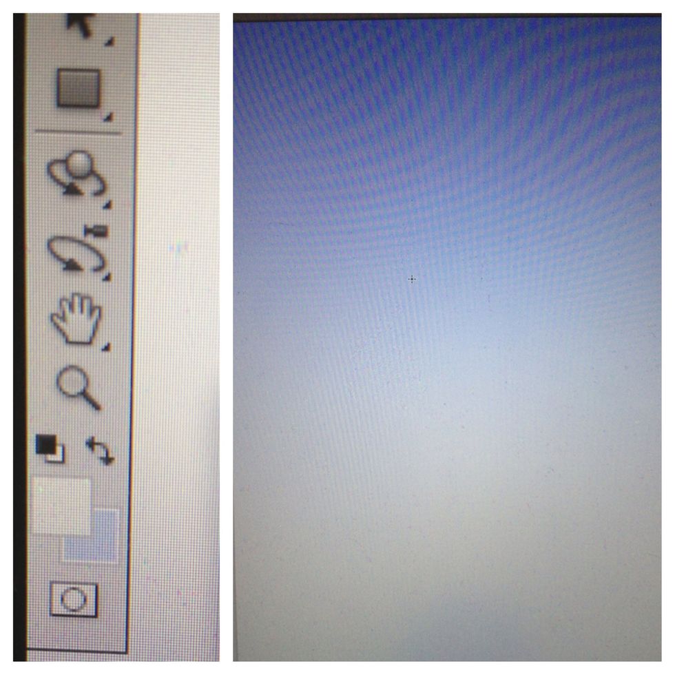 Create a new canvas (File>New). Switch your palette colors to a white and light blue and then use your gradient tool to fill in the canvas and make sure white is at the bottom