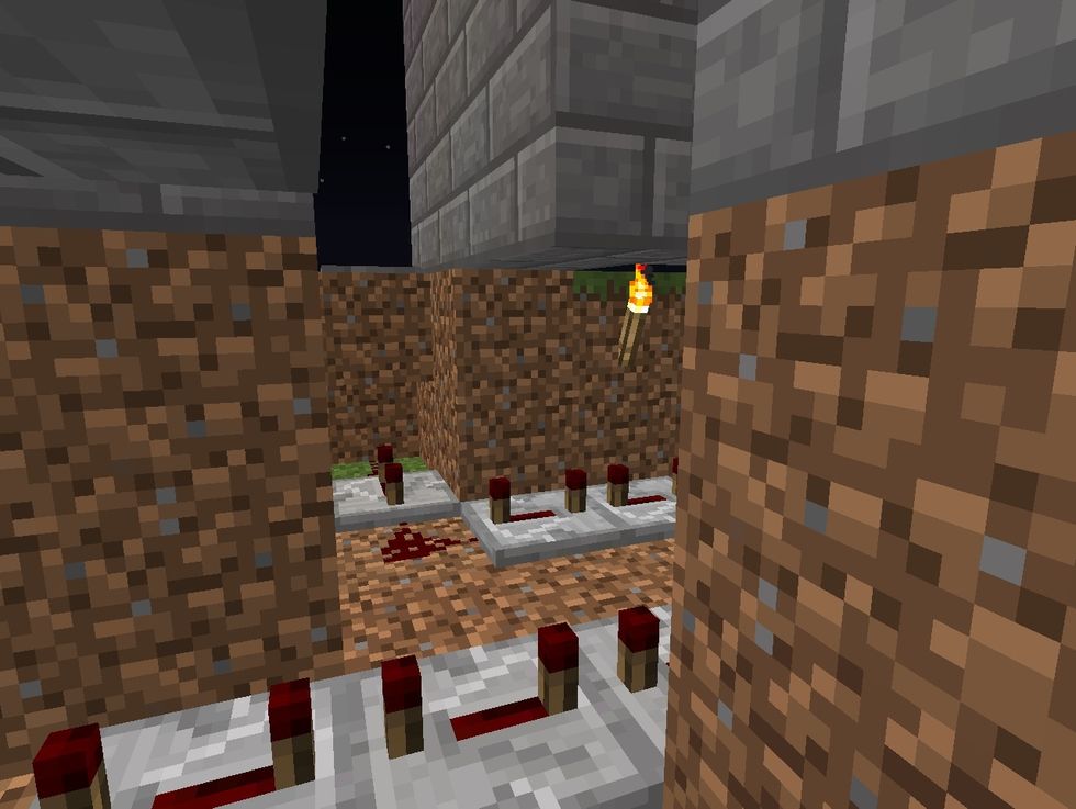 Create a path of redstone dust and repeaters that will last about the amount of time it would take to finish the maze.