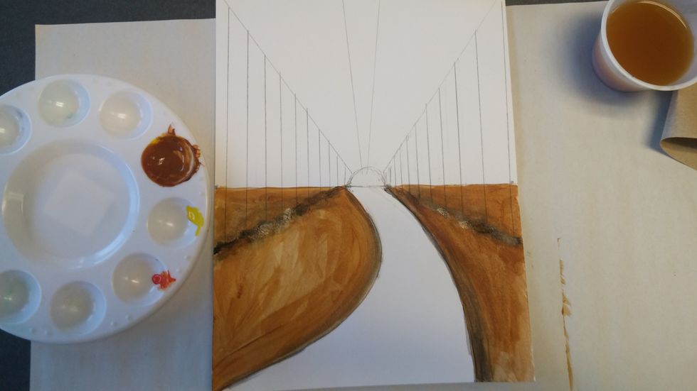 Create a shadow underneath where the trunks of your rees will sit. Also add shadows around the pathway